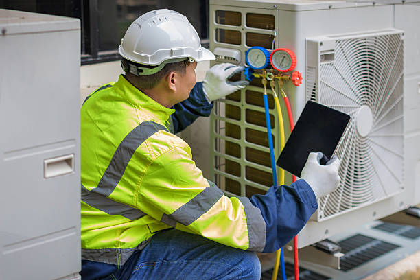 Professional Hvac technician working in Sand Lake, NY